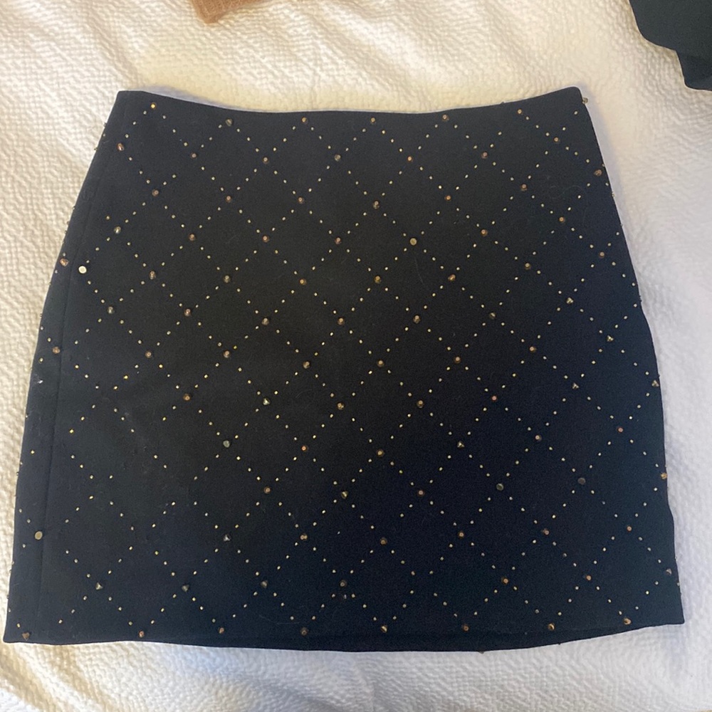 Club Monaco skirt with studs on it